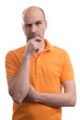 © spaxiax - pensive man wearing orange polo
