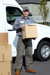 Wall Mural - Postman with parcel box.