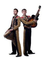 Image of funny musicians dressed as Spanish macho