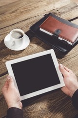 Wall Mural - Ipad. Woman shows screen of digital tablet in his hands