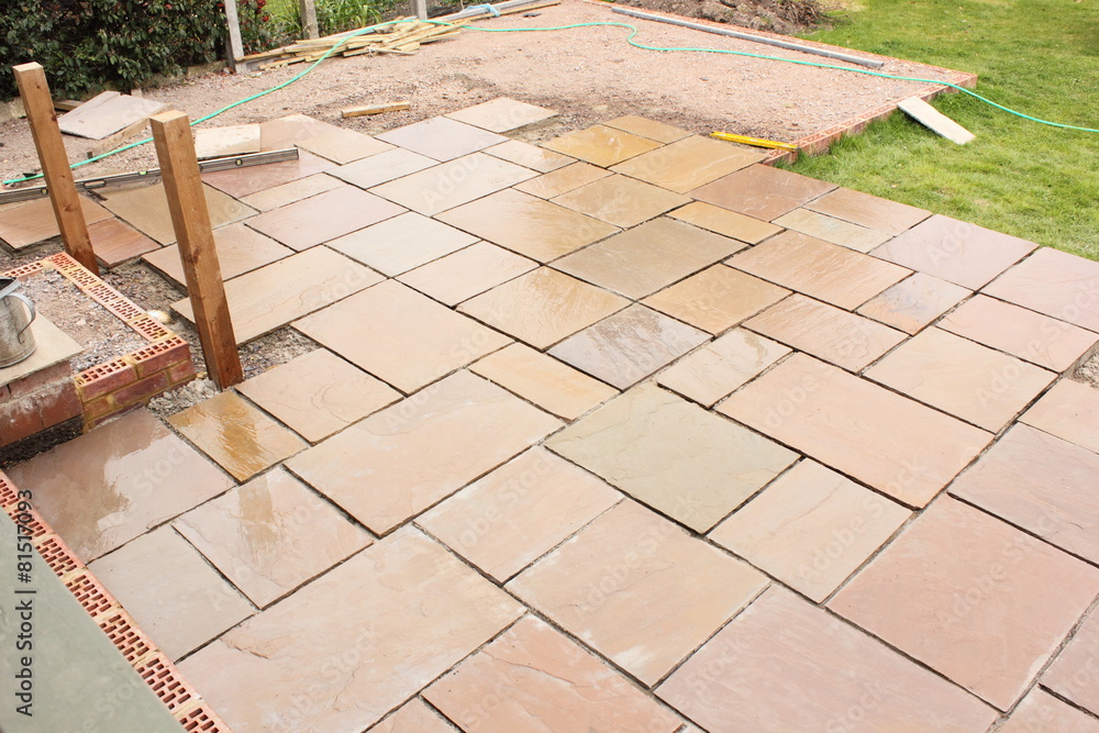 Building and laying a natural stone patio - obrazy, fototapety, plakaty 