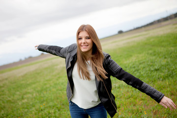 Sticker - Beautiful woman relaxing in the countryside