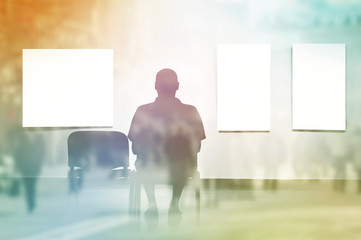 Double Exposure Man sitting in art gallery