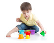 © Oksana Kuzmina - little boy playing with cup toys