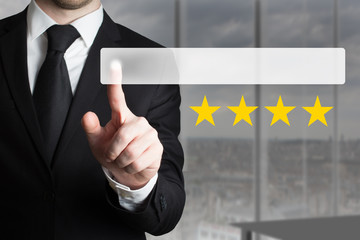 businessman pushing flat button four golden rating stars