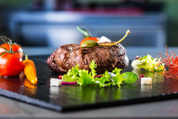 Beef steak with vegetable decoration