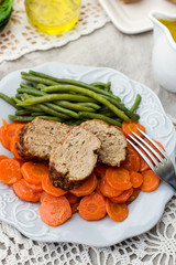 Wall Mural - Italian veal meatloaf polpettone with carrots and sauce