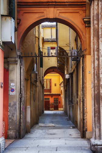 Fototapeta do kuchni small typical street in Bologna, Italy