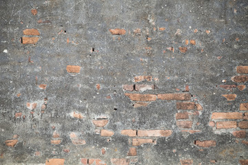 Old brick wall in a background image   with vignetted  grunge ba