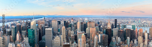 Fototapeta dla dzieci New York City skyline with urban skyscrapers at sunset.