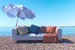 © denisgo - vacation concept background with interior elements and sea beach