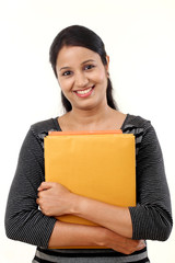 Wall Mural - Female student holding books