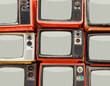 © somchairakin - Pile of old red retro TV