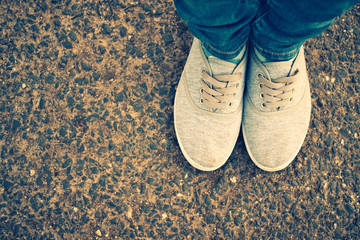 Wall Mural - woman jeans and sneaker shoes