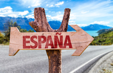 Wall Mural - Spain (in Spanish) wooden sign with road background