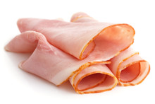 Premium Slices Of Ham Arranged On White.