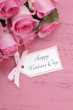 Happy Mothers Day Pink Roses Background.