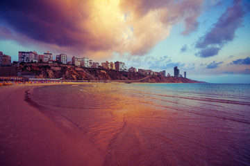 Fototapete - Netanya city at sunset, sea coast. Israel.