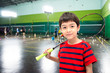 © wckiw - Little boy taking badminton racket in training class at the gym