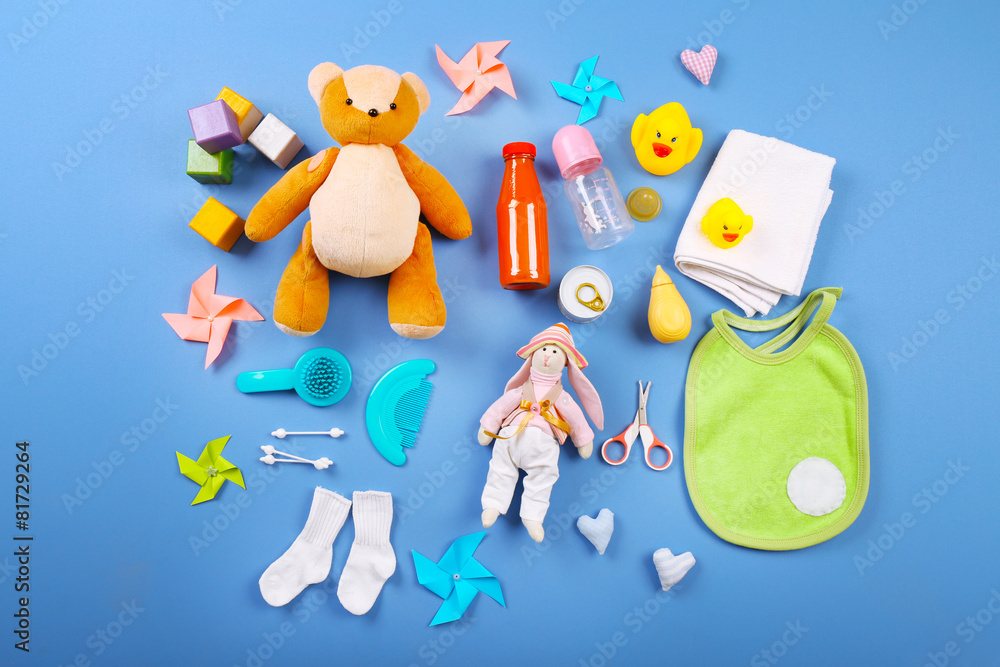 Baby collection on blue background, top view