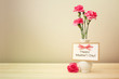 Mothers day message with pink carnations