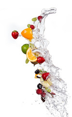 Fototapete - Mix of fruits with water splashes on white