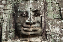 The Stone Face Of The Khmer King On The Wall Of Bayon Temple