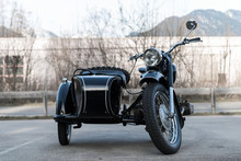 Frontview Of Black Old  Oldtimer Motorcycle With Sidecar