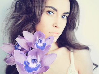 Beautiful lady with orchid