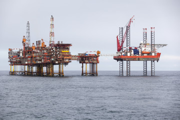 oil platform on the north sea while cloudy day