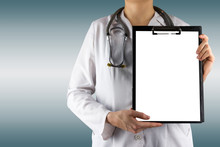 Female Doctor's Hand Holding Blank Medical Clipboard And Stethos