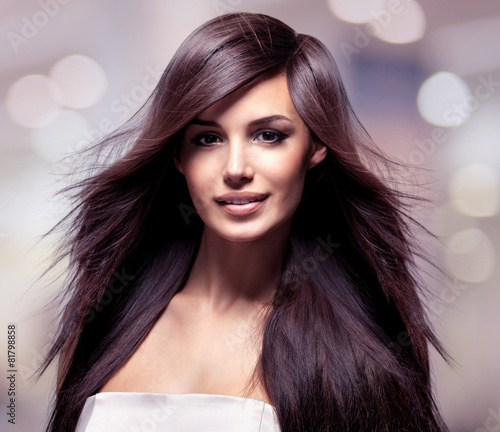 Naklejka dekoracyjna Fashion model with long straight hair.