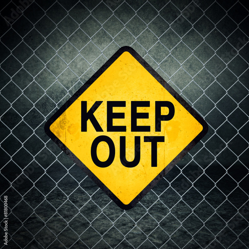 Keep Out Grunge Yellow Warning Sign on Chainlink Fence Poster