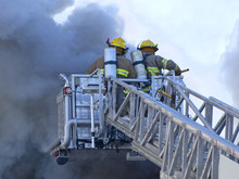 Ladder Truck With Firefighters