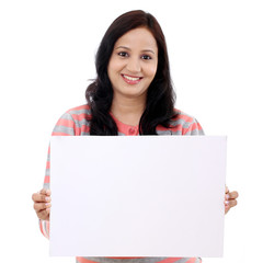 Canvas Print - Cheerful young woman holding a billboard