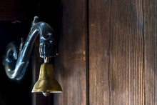 Brass Bell At The Door To The Old Style