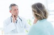 © WavebreakMediaMicro - Doctor touching his pulse