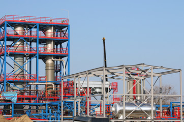 Wall Mural - workers on new petrochemical plant construction site