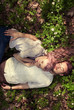 © VectorART - couple in love lying in the spring forest