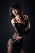 © andreiko - Sexy beautiful naked woman in black erotic lingerie on dark