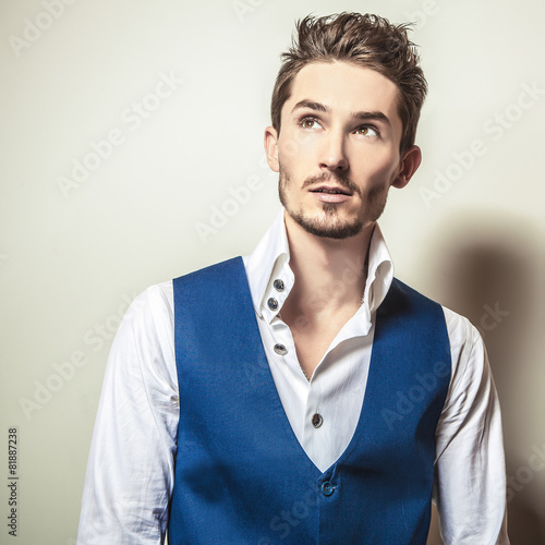 Naklejka na szybę Elegant young handsome man in white shirt & vest. 