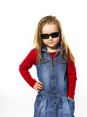 Cute little girl posing in mother's sunglasses, childhood concep