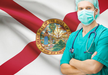 Wall Mural - Surgeon with US state flag on background series - Florida