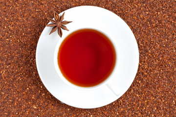 Wall Mural - Red traditional rooibos tea full of antioxidant in white cup