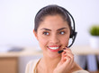 © lenets_tan - Close-up portrait of a customer service agent sitting at office