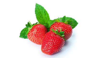 Ripe strawberries on white background