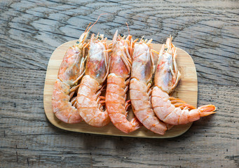 Sticker - Raw shrimps with lemon wedges