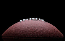 American Football Over Black Background
