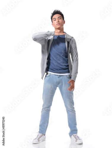 Full Length Young Man In Jeans Standing Posing Buy This Stock Photo And Explore Similar Images At Adobe Stock Adobe Stock Set of isometric superheroes isolated on white background. young man in jeans standing posing