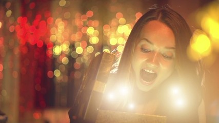 Sticker - Beauty girl opens Christmas gift box with miracle gift